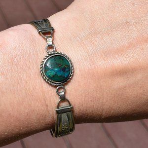Silver bracelet with chrysocolla.